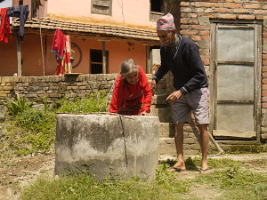 Man-and=wife-with-plant-and-toilet